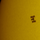 Image for article titled The ISS as it Crosses the Face of the Sun